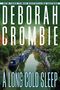 Text: "Deborah Crombie, A Long Cold Sleep, A Novel". Szenenbild: Kanal mit Booten, Bäume entlang der Ufer., Buch