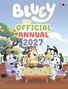 Text: "Bluey: The Official Annual 2027". Illustration von Hunden, die an einem Tisch sitzen und eine Mahlzeit teilen.