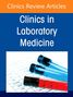 Oben steht "Clinics Review Articles", darunter "Clinics in Laboratory Medicine". Es gibt blau-rote Reagenzgläser auf Papier.
