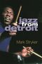 "jazz from detroit" und "Mark Stryker" sind zu sehen. Ein schwarzer Musiker spielt Schlagzeug, energetischer Ausdruck., Buch