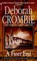 „Crombie is writing in P.D. James territory” – Associated Press. Deborah Crombie: A Finer End. Bild einer alten Ruine.