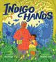 „Indigo Hands“ in blauer Schrift, zeigt eine ältere Person und ein Kind lächelnd in einem blumigen Garten, umgeben von Natur.