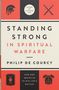 Text: "Standing Strong in Spiritual Warfare" von Philip De Courcy. Oben und unten antike Waffen- und Rüstungssymbole., Buch