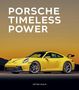 „PORSCHE TIMELESS POWER“ Text über einem gelben Sportwagen (GT3) vor einem orangefarbenen Himmel, unten „PETER RUCH“.