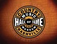Logo mit Text: "Country Music Hall of Fame and Museum Nashville". Außenrand: "Will the Circle Be Unbroken". Holzartige Textur., Buch