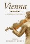 „Vienna: A Musical History, Edited by Simon P. Keefe“. Eine goldene Statue spielt Geige., Buch