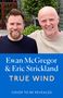 Aufschrift: "Ewan McGregor & Eric Strickland TRUE WIND COVER TO BE REVEALED". Zwei Männer lächeln in die Kamera.