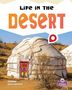 "Life in the Desert", große gelbe und rote Schrift. Janine Deschenes. Bild: Runde Zeltstrukturen in Wüste., Buch