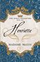 „The King’s Daughters, Book One, Henriette, Madame McCoy“ in elegantem Schriftzug mit goldenen Verzierungen auf Blau.