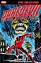 „Daredevil: The Man Without Fear! Redemption.“ Illustration eines Superhelden im Regen mit grimmigem Gesicht im Hintergrund.