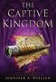 "The Captive Kingdom" steht groß oben. Darunter: "Uncover the past... defend the future." Im Hintergrund eine alte Karte.