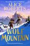 Text: "Alice Roberts, Wolf Mountain." Illustration: Frau mit Speer und Wolf in schneebedeckten Bergen, Mammuts im Hintergrund.