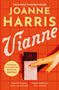 "JOANNE HARRIS Vianne" in großen gelben Buchstaben, rote Kacheln, eine Hand hält Schokolade in rot-weißem Papier.