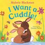 Text: "Malorie Blackman I Want a Cuddle! Illustrated by Joanne Partis." Zwei Hasen umarmen sich, umgeben von Blumen auf gelbem Hintergrund., Buch