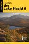 HIKING the Lake Placid 9: A Guide to the Adirondack Hiking Challenge, Felsvorsprung, See, bewaldete Hügel im Herbst., Buch