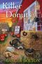 Texte: "Killer Donuts", "Cider & Donuts", "Entrance", "A Deputy Donut Mystery", "Ginger Bolton". Illustration: Katze, Spinnen, Kürbisse., Buch