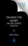 Text: "Cover to be revealed soon! TAMING THE HEART: DELUXE LIMITED EDITION by Elliott Rose." Unten ein Logo mit einem offenen Buch.