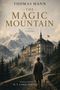 "THOMAS MANN, THE MAGIC MOUNTAIN, A NOVEL, TRANSLATED BY H. T. LOWE-PORTER." Illustration eines Mannes vor Hotel und Bergen., Buch