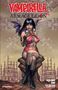 "Vampirella Armageddon Volume One" steht groß im Bild. Eine Frau in rotem Kostüm sitzt mit einem Schädel in der Hand., Buch