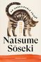 Text: „An Undesirable Friend“, „Natsume Sōseki“, „Vintage Classics“. Illustration einer grünäugigen Katze mit gestreiftem Fell., Buch