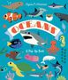 "Oceans: A Pop-Up Book" von Ingela P Arrhenius. Bunte Meereslebewesen und ein Hai auf blauem Hintergrund, Illustration.