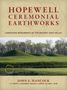 "HOPEWELL CEREMONIAL EARTHWORKS" mit grünen Hügeln, Bäumen und einer UNESCO-Logo in einem Landschaftsfoto., Buch