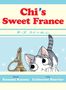 Text: "Chi’s Sweet France" und japanische Schriftzeichen. Illustration einer neugierigen Katze und einem Eiffelturm-Schlüsselanhänger., Buch