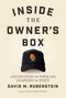 "Inside the Owner's Box" von David M. Rubenstein; zeigt eine Mütze mit einem orangenen Bürostuhl-Logo.
