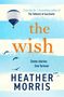Text: "From the No. 1 bestselling author of The Tattooist of Auschwitz", "the wish", "Some stories live forever", "HEATHER MORRIS". Ein Heißluftballon fliegt über Vögel., Buch