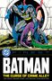 „THE CURSE OF CRIME ALLEY“. Batman beschützt eine verletzte Frau in Katzengestalt in einer dramatischen Comic-Illustration.