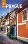 „PRAGUE“ und „Free eBook“ sind hervorgehoben. Eine bunte Straßenansicht mit kleinen, traditionellen Häusern., Buch