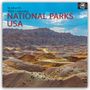 „16-Month 2026 Calendar NATIONAL PARKS USA“. Eine hügelige Landschaft mit einem geschwungenen Weg und bewölktem Himmel.