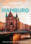 Text oben: "POCKET HAMBURG". Unten: "Discover twice the city in half the time." Bild einer historischen Backsteinarchitektur., Buch