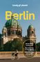 Text: "Berlin, Berlin Wall cycle tour, Bar hopping in Kreuzberg, Dive into the art scene". Große Kuppel, Frau auf Fahrrad., Buch