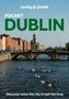 lonely planet POCKET DUBLIN. Schwimmer im Fluss vor einer steinernen Brücke und historischen Gebäuden., Buch