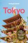 Text: Lonely Planet, Tokyo, Shop traditional crafts, Explore anime and manga, Live music clubs. Pagode vor blauem Himmel., Buch