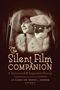 "The Silent Film Companion: A Recovered & Expanded History." Nostalgisches Foto: Frau mit Hut, Mann mit Maske., Buch