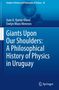 Buchcover: "Giants Upon Our Shoulders: A Philosophical History of Physics in Uruguay". Blauer Hintergrund, Globus, Bücherstapel, Apfel., Buch