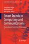 "Smart Trends in Computing and Communications" auf orangefarbenem Hintergrund mit Molekülstruktur. Springer-Logo unten., Buch