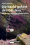 Titel: "Die Nacht gehört den Geistern" von Kathrin Schuster. Eine Frau hält eine Trommel vor einer bunten, felsigen Kulisse., Buch