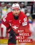 "ROT. WEISS. WELT-KLASSE." Ein Eishockeyspieler in roter Ausrüstung mit Schweizer Kreuz, Helm mit Aufschrift "DENNER".