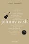 Text: "holger hanowell", "johnny cash", "man in black", "100 Seiten". Stil: Schlichtes Buchcover mit Gitarre., Buch