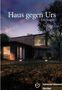 "**Haus gegen Urs** von Urs Luger.** Abendszene eines modernen Hauses mit großen Fenstern, umgeben von Bäumen.", Buch