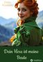 Text: "Della Klaassen", "Dein Herz ist meine Beute", "tredition". Eine Frau mit roten Haaren und grünem Kleid lächelt., Buch