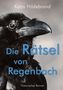 "Katja Hildebrand", "Die Rätsel von Regenbach", "Historischer Roman" vor einem Schwarz-Weiß-Rabbauschnitt., Buch