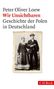 "Peter Oliver Loew: Wir Unsichtbaren. Geschichte der Polen in Deutschland." Ein altes Foto eines Paares in traditioneller Kleidung., Buch