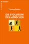 „Die Evolution des Menschen“ von Thomas Junker. Silhouetten wandelnder Vorfahren auf orangefarbenem Hintergrund., Buch