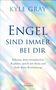 "KYLE GRAY. ENGEL SIND IMMER BEI DIR. Erkenne deine himmlischen Begleiter, sprich mit ihnen und finde deine Bestimmung. IRISIANA." Hintergrund in pastellfarbenen, verschwommenen Lichtstrahlen., Buch
