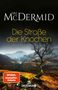 "Val McDermid. Die Straße der Knochen. Ein Fall für Karen Pirie. SPIEGEL Bestseller-Autorin. Droemer."  
Eine herbstliche Hügellandschaft., Buch