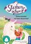 „Sternenschweif“, „Einhornzauber auf dem Bauernhof“. Ein weißes Einhorn, ein Mädchen mit Huhn und bunte Wiesen im Hintergrund., Buch